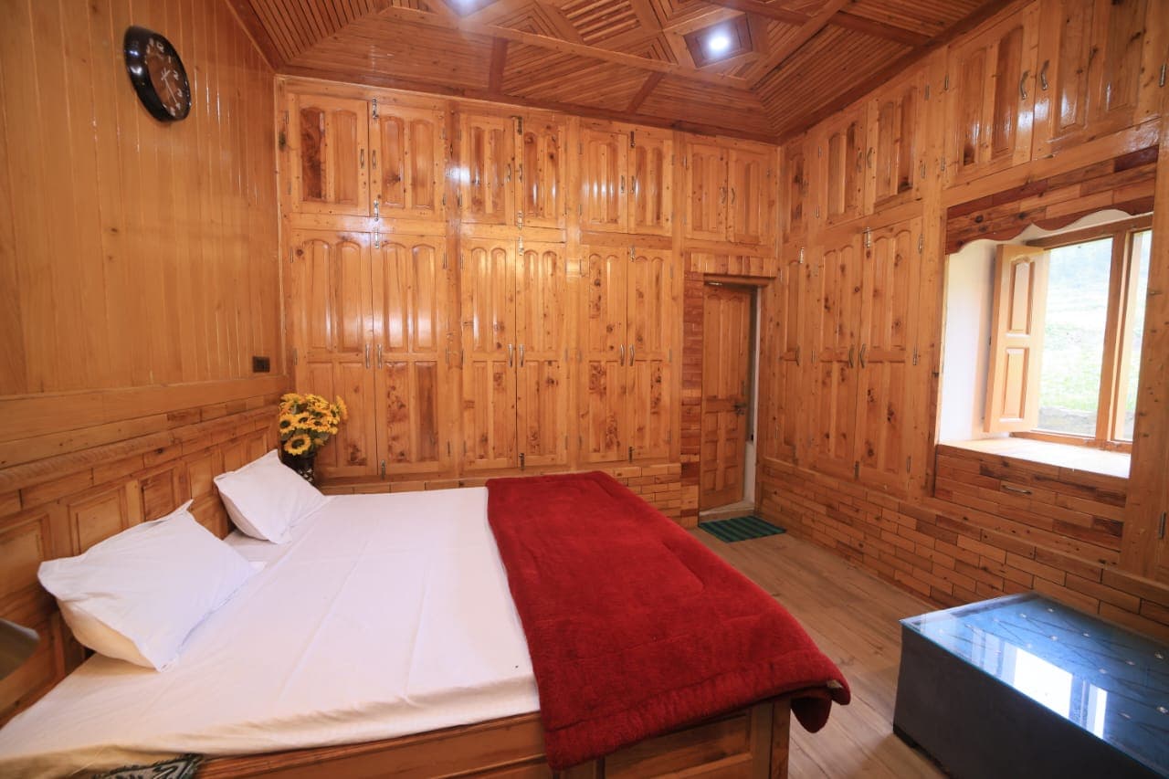 Pathway through trees around the homestay